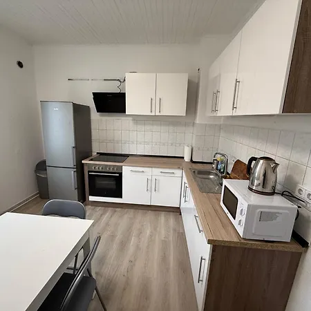 Monteurhaus Am Airport Apartmán *